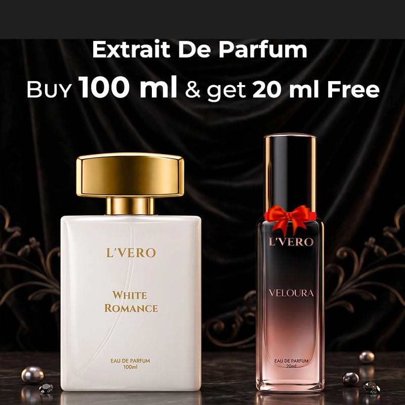 L'Vero Extrait De Parfum promotional image showing a large white bottle labeled 'White Romance' with a gold cap next to a smaller pink-tinted bottle labeled 'Veloura' with a black cap and red bow. Text at the top reads 'Extrait De Parfum Buy 100 ml & get 20 ml Free'.